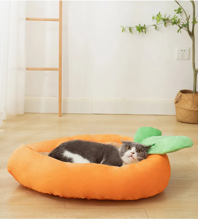 Carrot-shaped nesting dog bed with a soft blanket in two size options for small and medium pets.