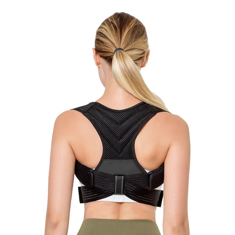 Black adjustable anti-humpback posture correction belt worn on a person's torso, showing shoulder straps and chest support.