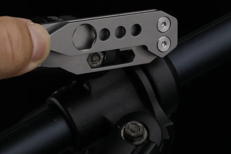 Titanium alloy multi-function crowbar tool with bottle opener and screwdriver, in gun grey finish.
