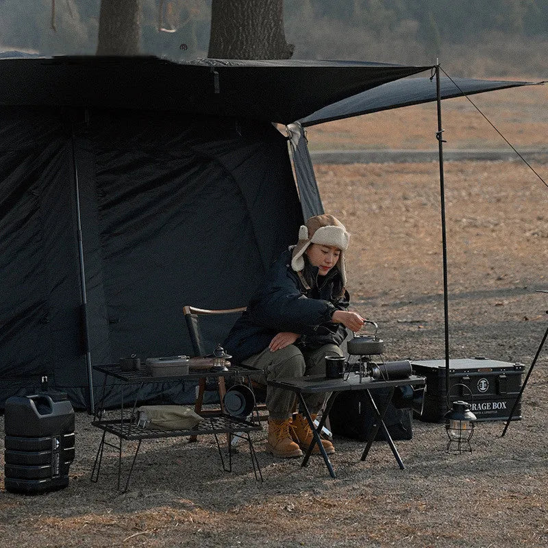 Black folding outdoor camping table made of stainless steel and aluminium, 600 x 350 x 375mm size