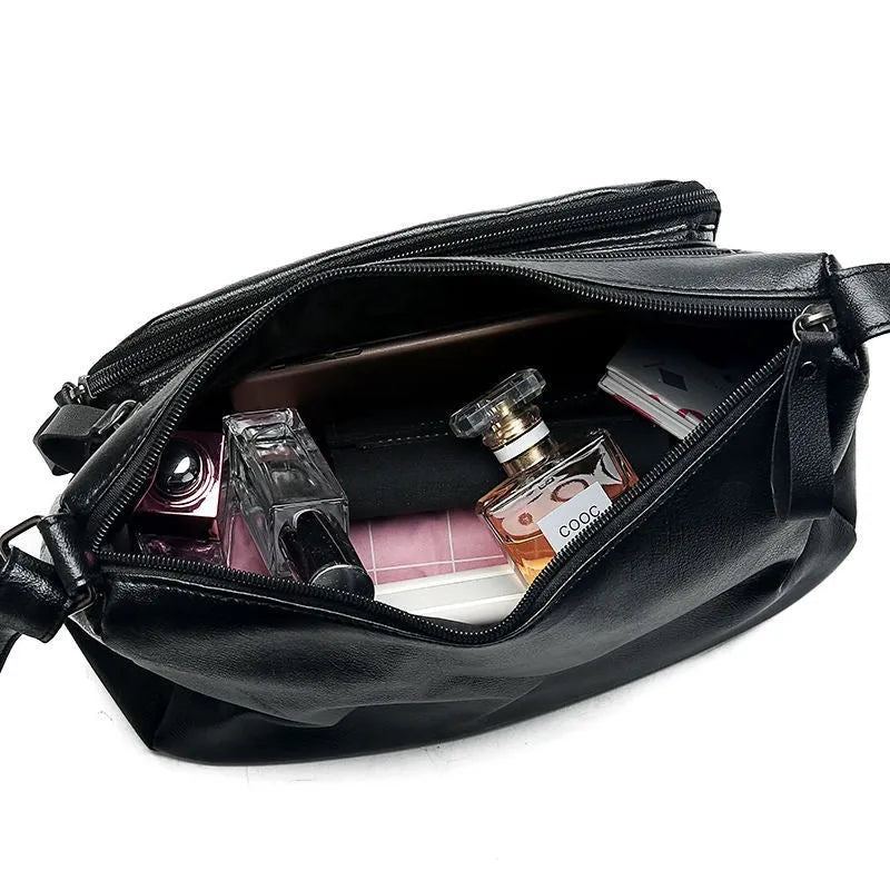 Black soft PU leather messenger bag with retro stitching and single shoulder strap