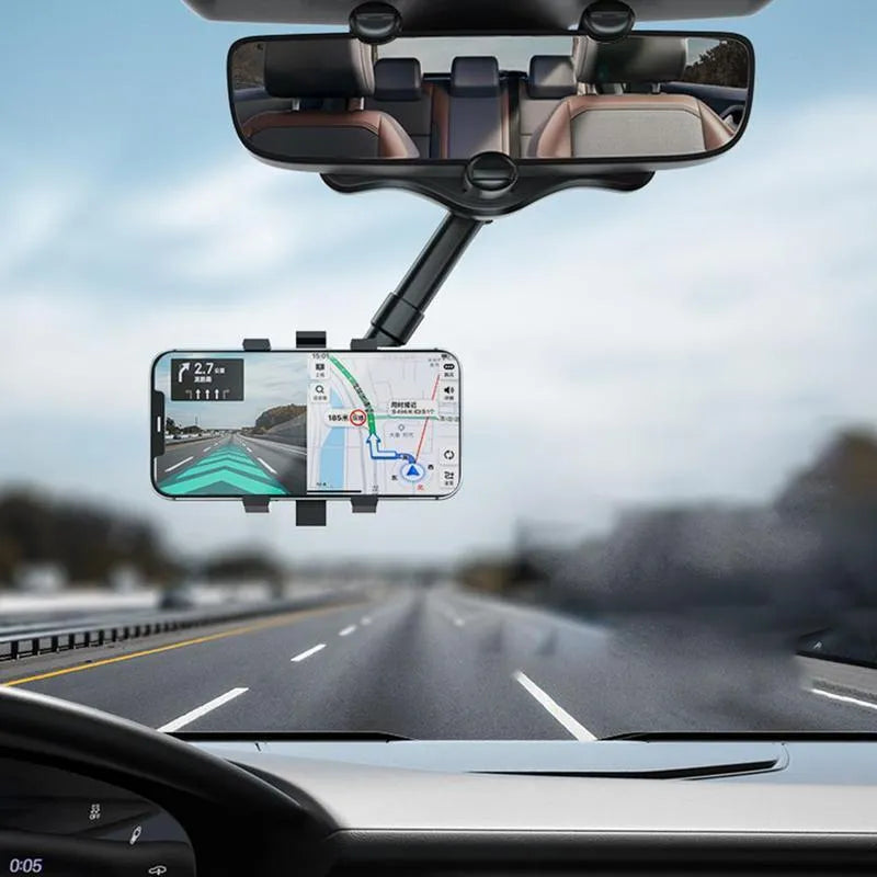 Black rearview mirror car phone holder with telescopic arm and four-claw bracket on a car mirror.