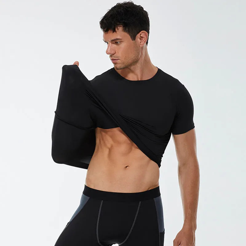 Men's solid colour short-sleeved fitness shirt in quick-drying polyester, shown in multiple colour options.