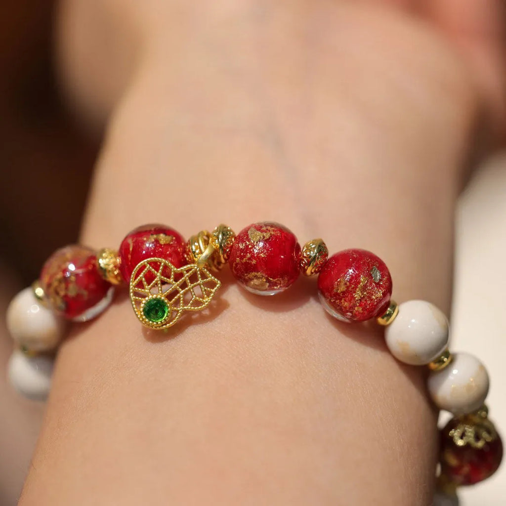 Women's ethnic style geometric bracelet with gold foil coloured glaze in Xingshi design