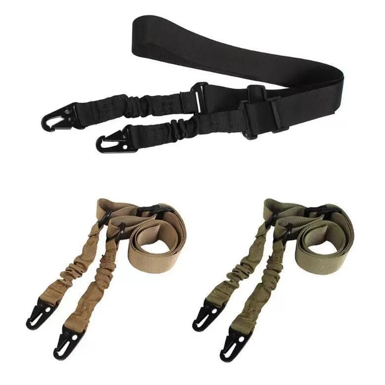 Black crossbody nylon survival tool placement rope with metal buckle and elastic tension adjustment on plain background
