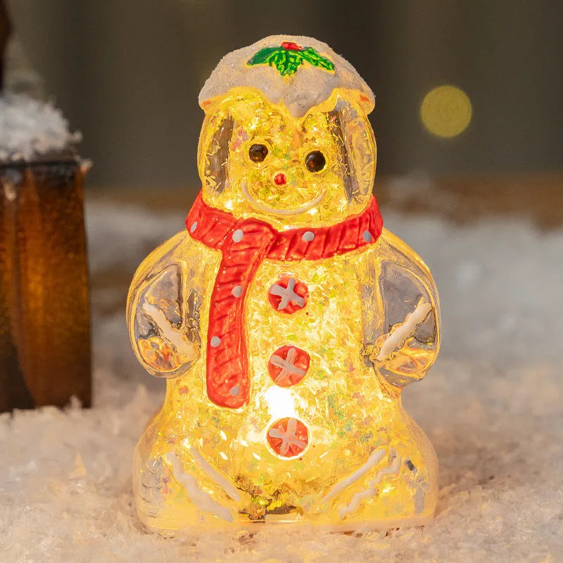 Glowing Christmas gingerbread man snowman ornament with a red scarf, plastic decoration.