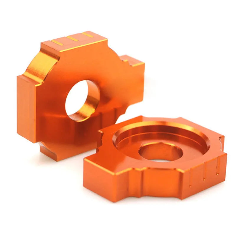 Orange anodised aluminium adjuster screws for KTM DUKE motorcycle rear forks