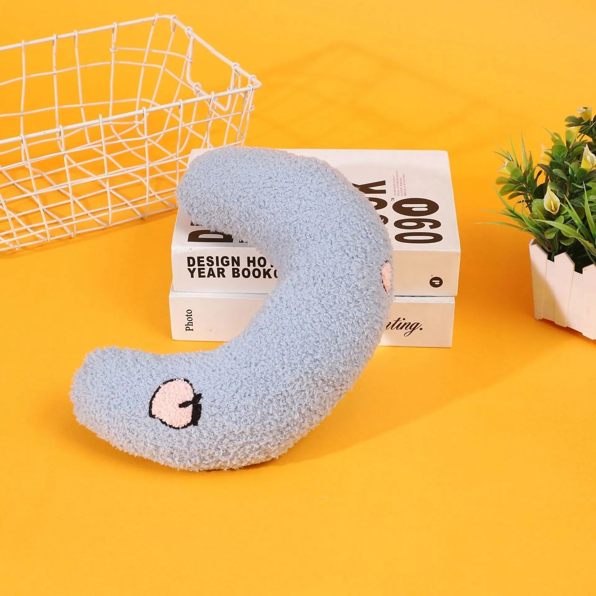 Cartoon U-shaped half moon pet pillow for dogs and cats in yellow colour option