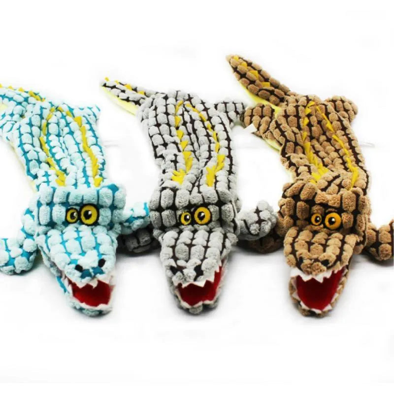 Blue corduroy plush crocodile dog toy with squeaker, shown next to a coffee-coloured large size version.
