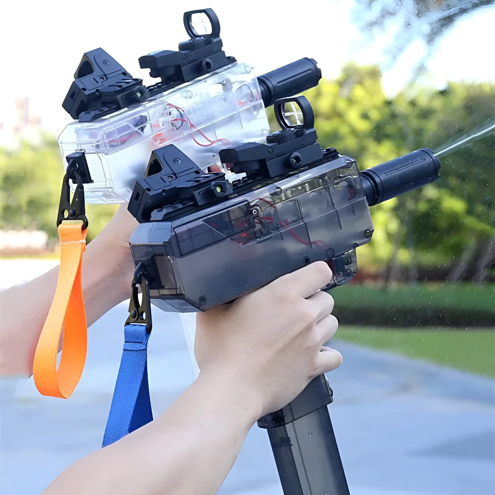 Electric water gun toy with transparent casing showing internal water level, includes sight glass and holoscope accessories