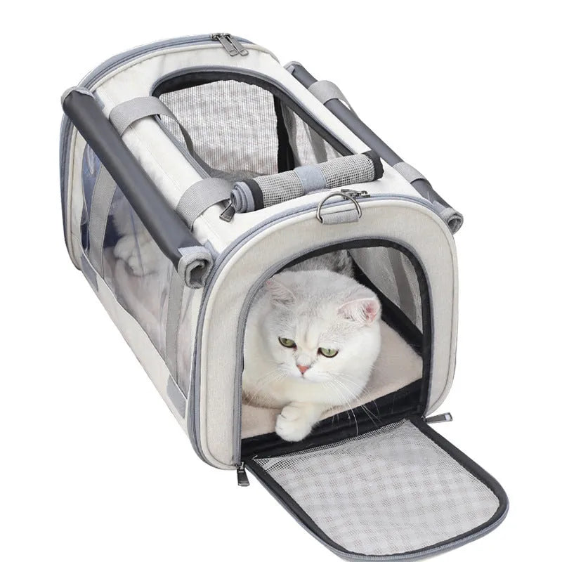 Outdoor portable pet bag in beige with transparent window and mesh sides on a white background