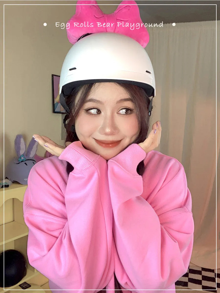 Soft plush bow helmet decoration in red, pink, or rose pink for motorcycle or ski helmet customisation.