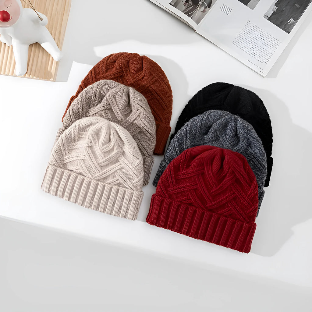 Women's wool knitted dome crown winter hat with a totem pattern, shown in one of six available colours.