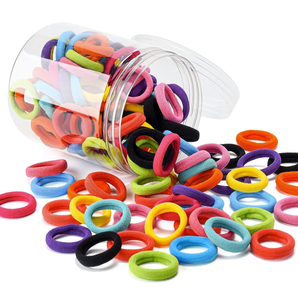 100 seamless cotton baby hair ties in 10 colours displayed in jar packaging