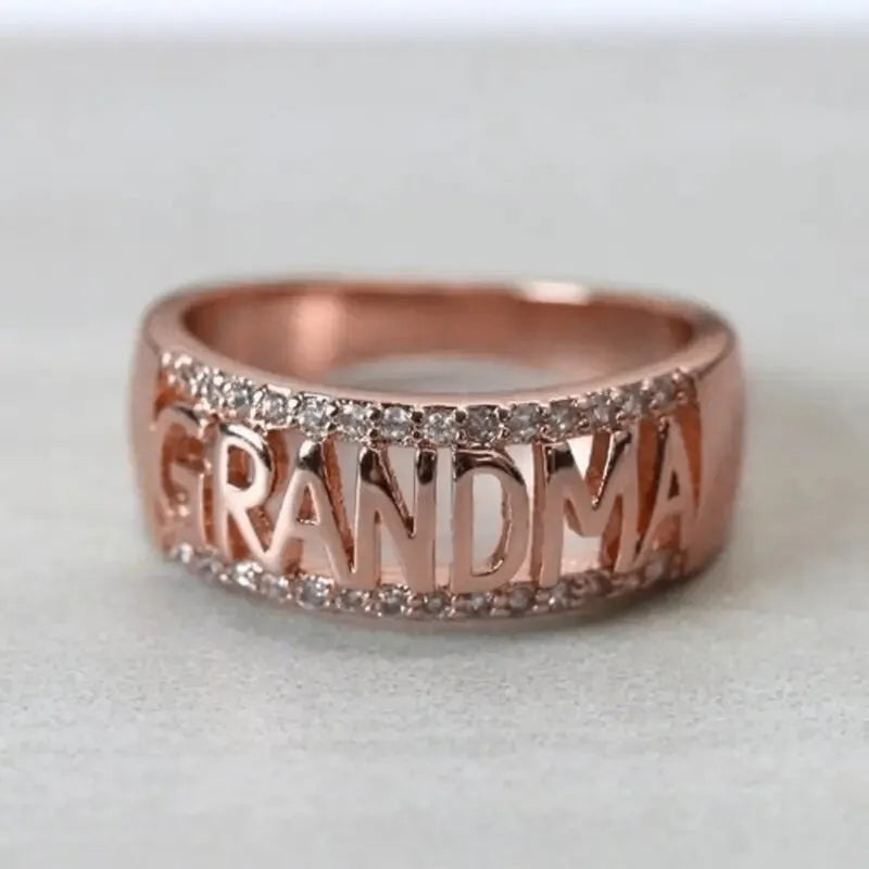 Three-row geometric round four-claw inlaid zircon ring for women in rose gold colour on copper base