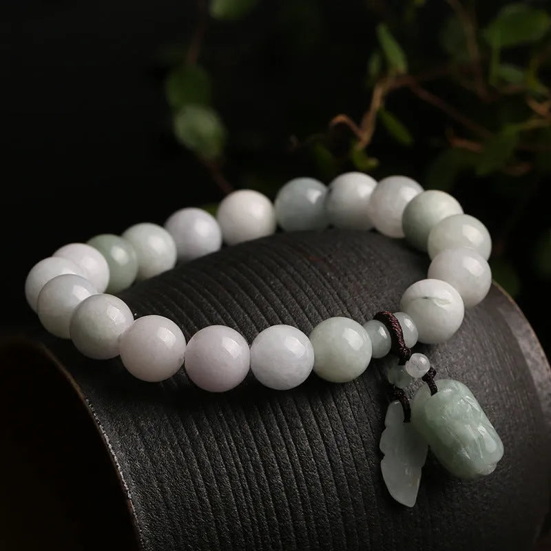 Natural jade bracelet with Maitreya Buddha and prosperity charm pendants