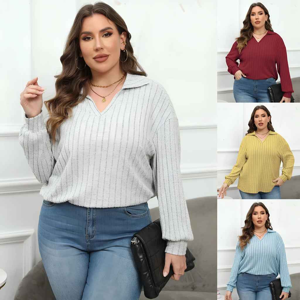 Women's plus size grey polo collar blouse with lantern sleeves made from polar fleece fabric.