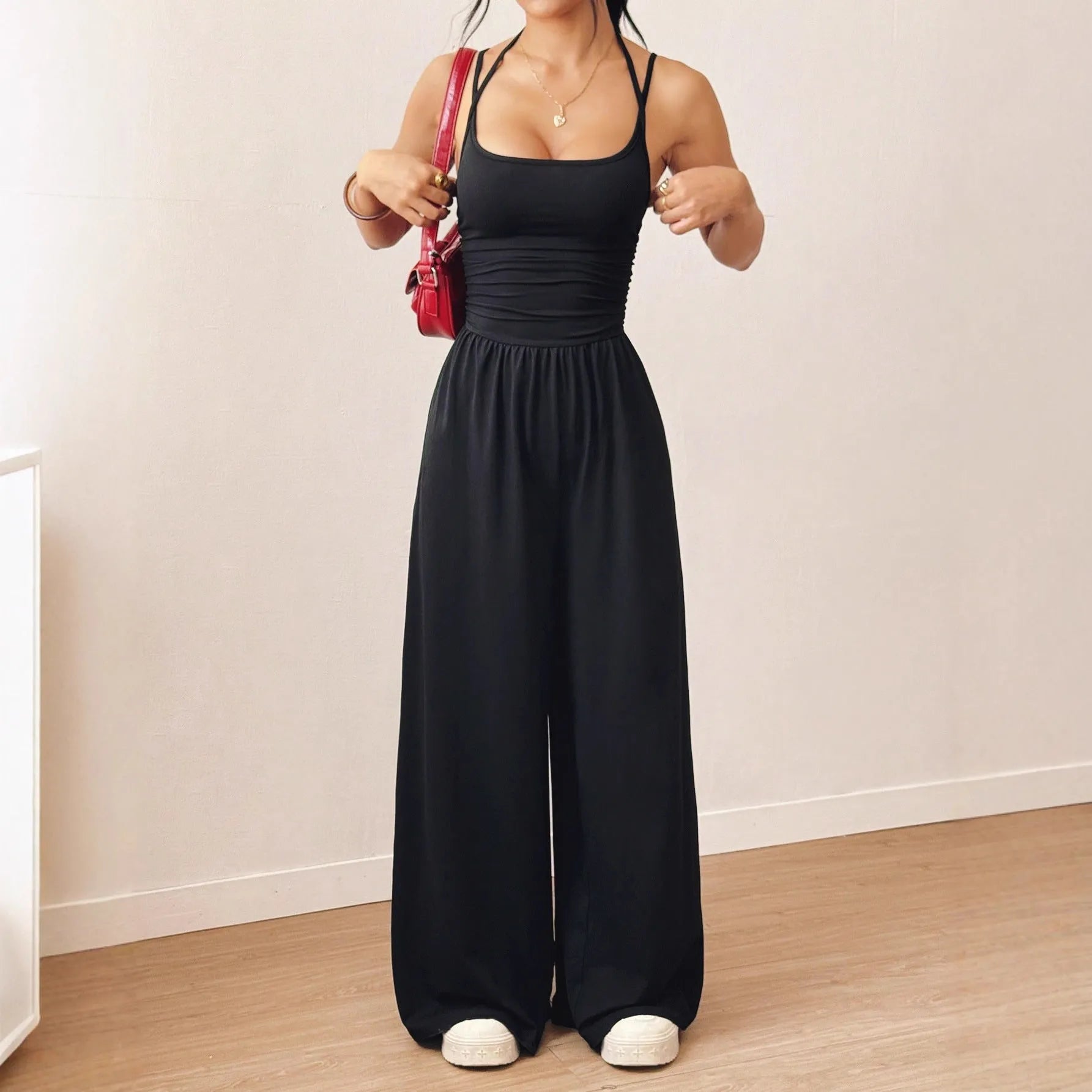 Women's casual jumpsuit with elastic waist and side pockets in black, navy, gray, and burgundy colour options