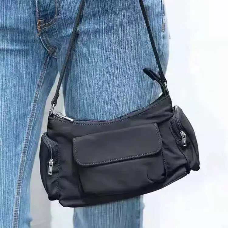 Black PU leather women's shoulder bag with double pockets showing side line design