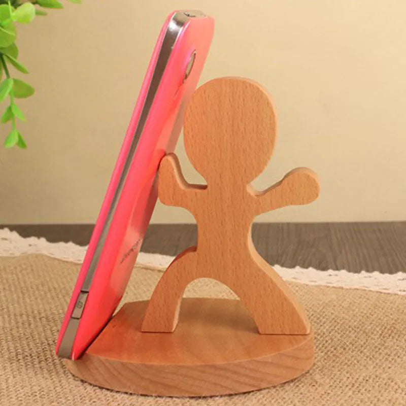 A decorative resin mobile phone stand holding a smartphone, shown in an animal design variant.