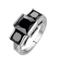 Colourful women's metal ring in copper with electroplated finish, showing geometric and rainbow design.