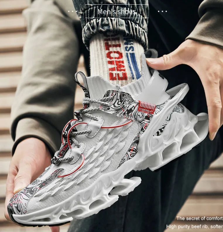 Soft bottom blade running sneaker in white with breathable mesh upper and rubber sole, high mouth design