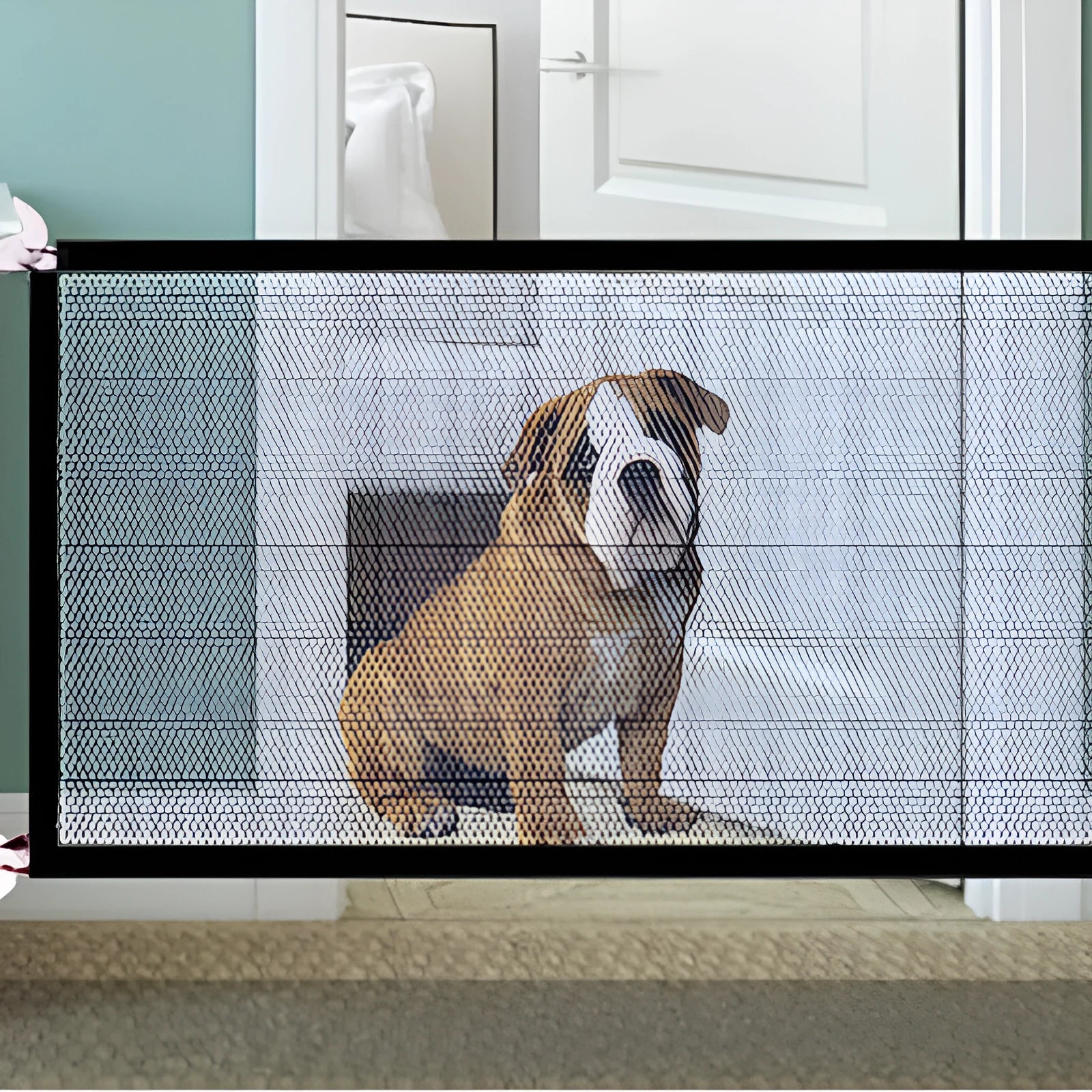 Black foldable cloth pet fence for dogs, placed indoors near doorway