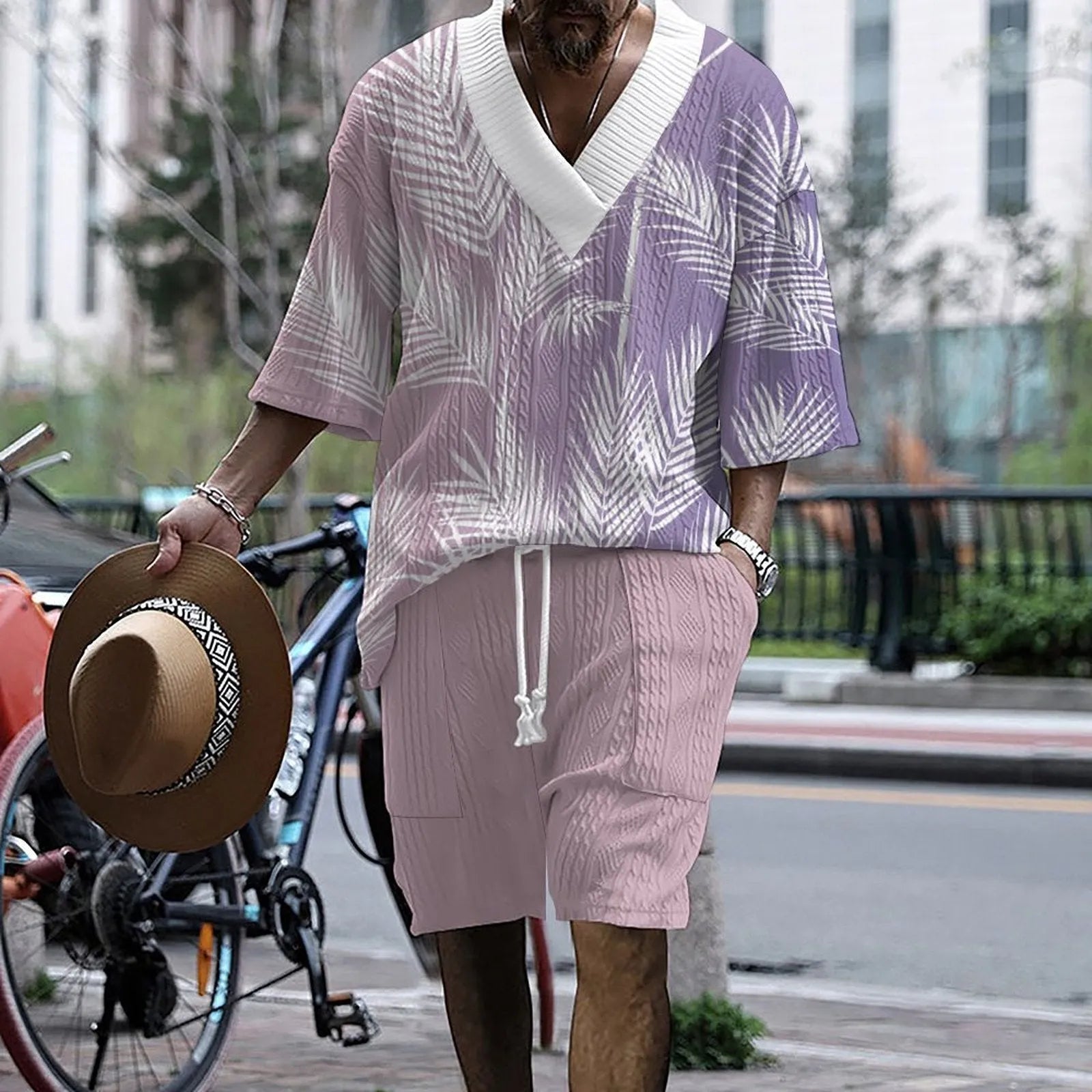 Men's printed knitted drop-shoulder short-sleeved top and shorts lounge set.