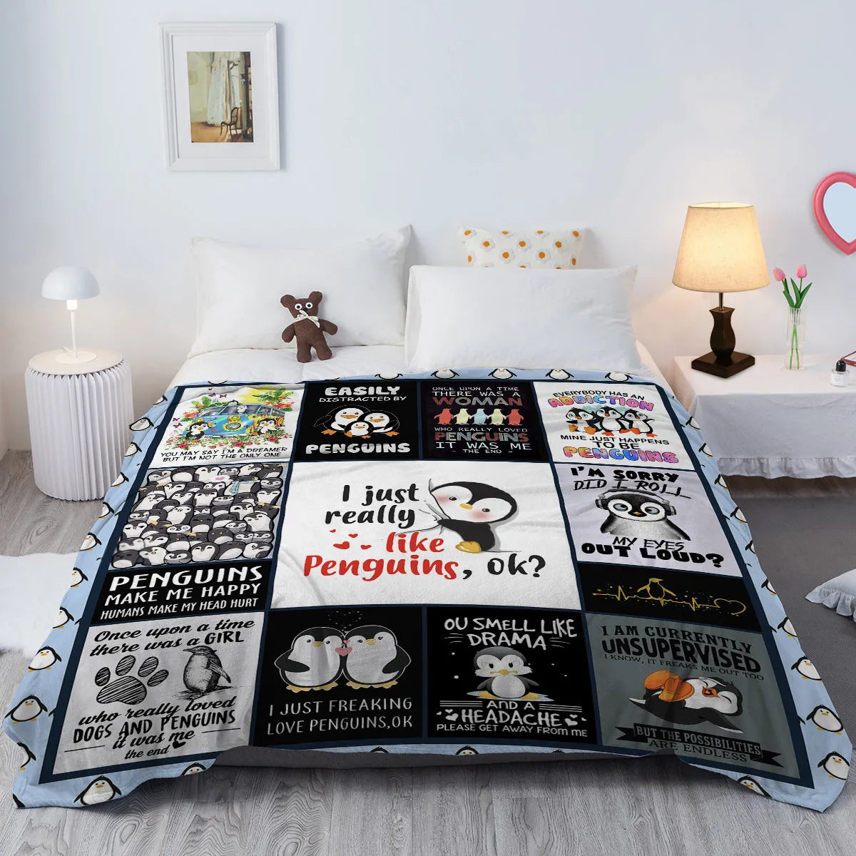 Multicoloured flannel throw blanket with penguin patterns, 130x150cm size on a sofa