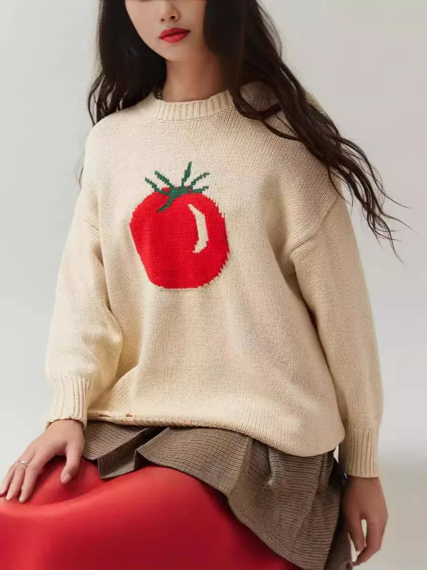 Women's loose-fitting milky white acrylic sweater with jacquard pattern and round neck.