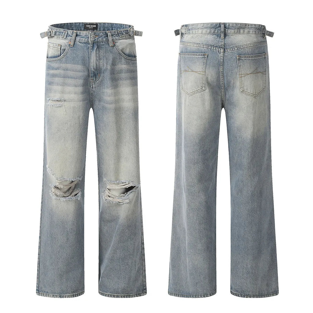 Men's blue straight-leg ripped jeans on a white background showing retro detailing and zip fly