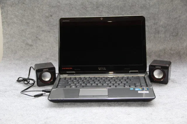 Small black square USB-powered computer speaker for 700B PC desktop