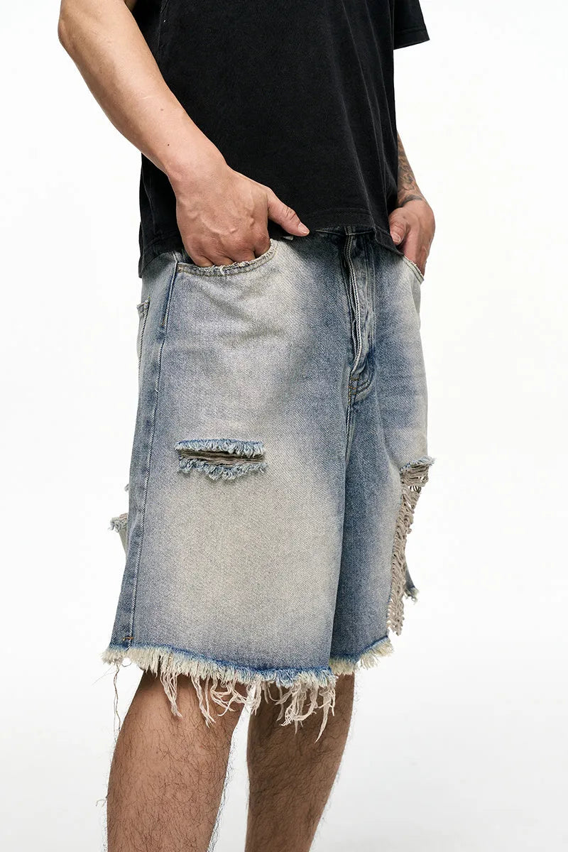 Light blue retro washed men's baggy denim shorts with wide leg and mid waist