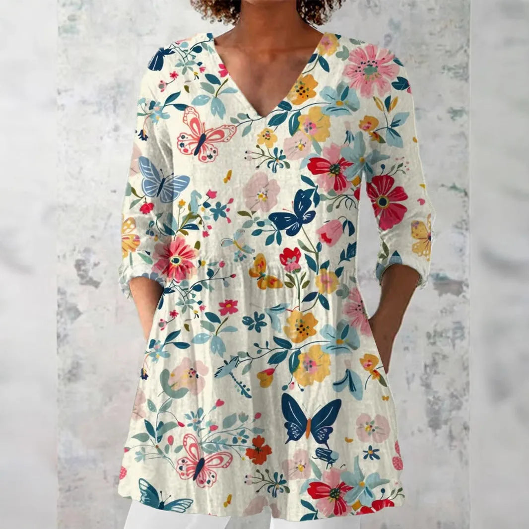 Women's slim fit retro patterned long-sleeved top in a polyester fabric, shown in one of twelve available colourways.
