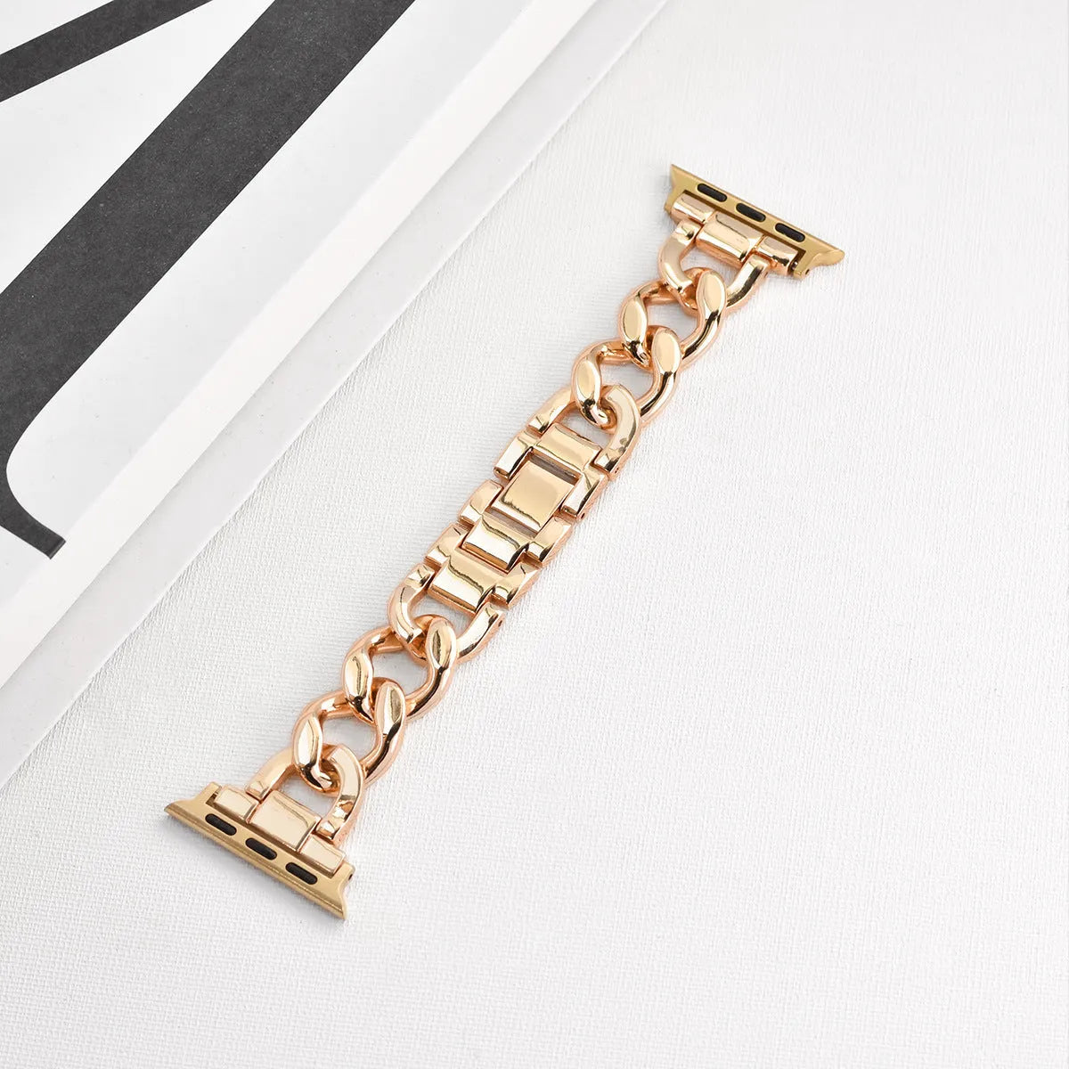 Metal denim chain link Apple Watch strap in silver, black, gold, rose gold and starlight colours.