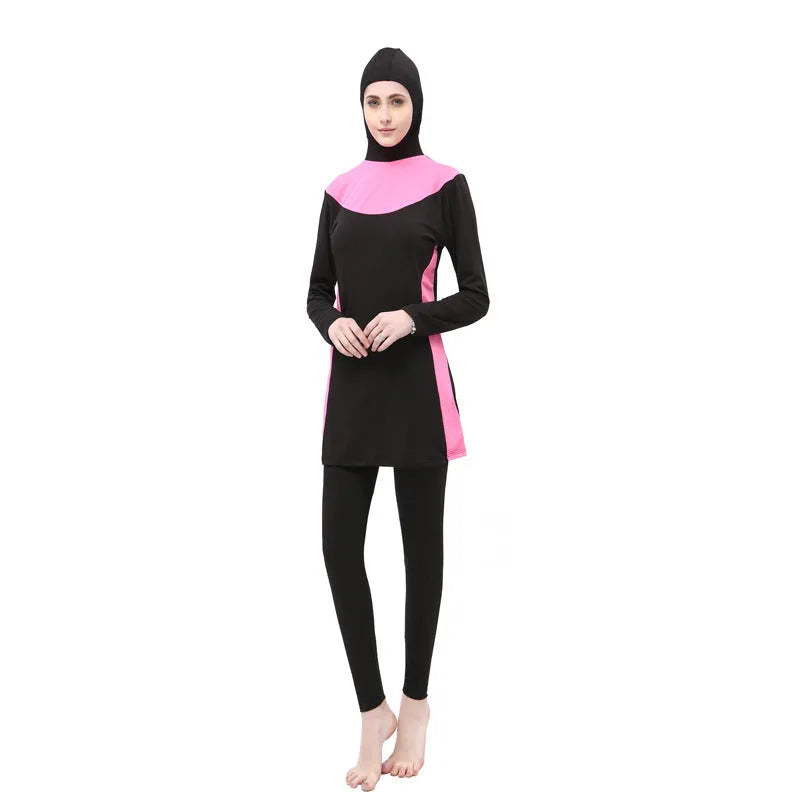 Conservative black and rose red women's swimsuit set with long sleeves, hood, and trousers.