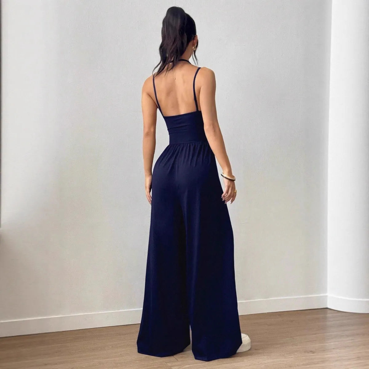 Women's casual jumpsuit with elastic waist and side pockets in black, navy, gray, and burgundy colour options