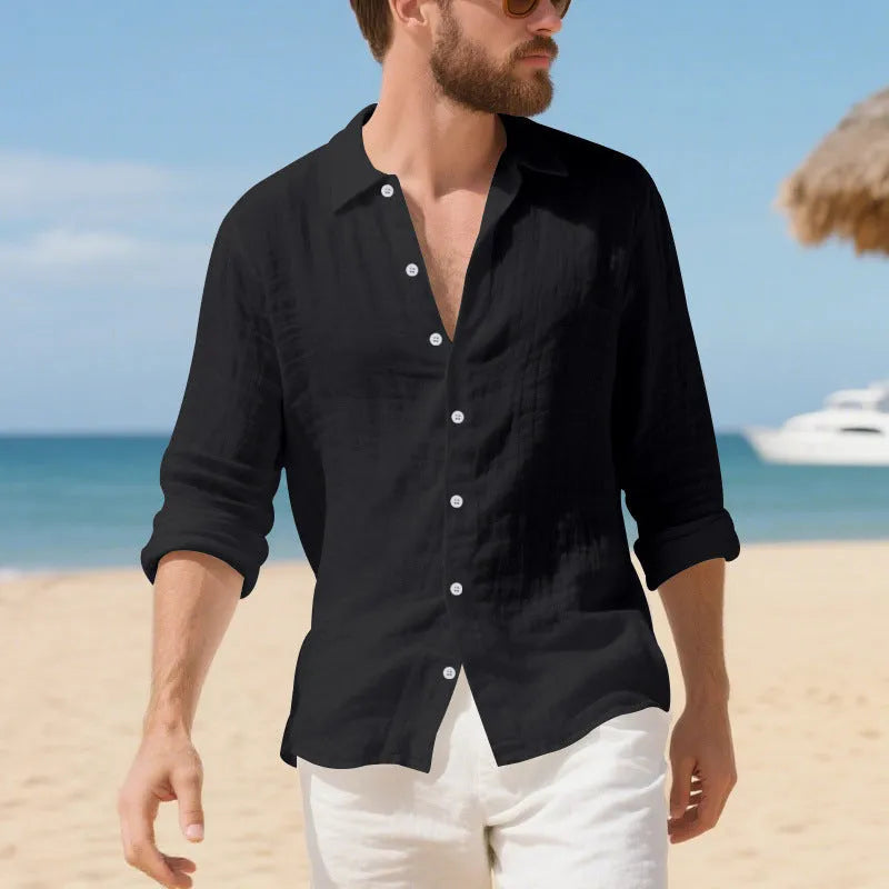 Man wearing a loose-fit light blue linen casual shirt with non-iron finish, showing relaxed American style.