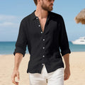 Man wearing a loose-fit light blue linen casual shirt with non-iron finish, showing relaxed American style.