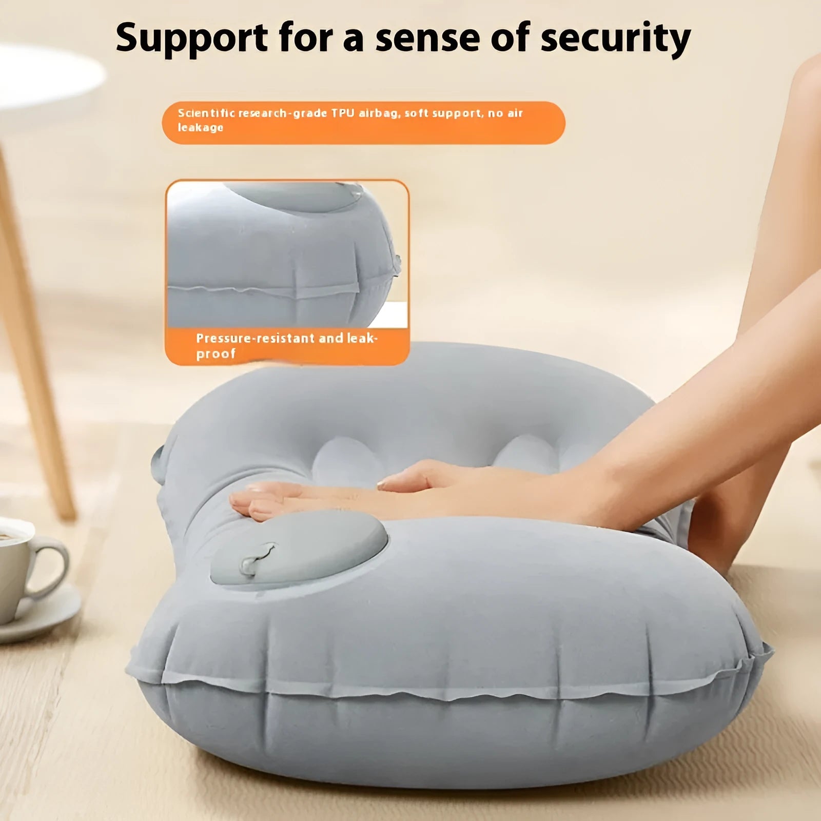 Inflatable travel pillow in grey colour showing rectangular 45x30cm shape with 13cm thickness