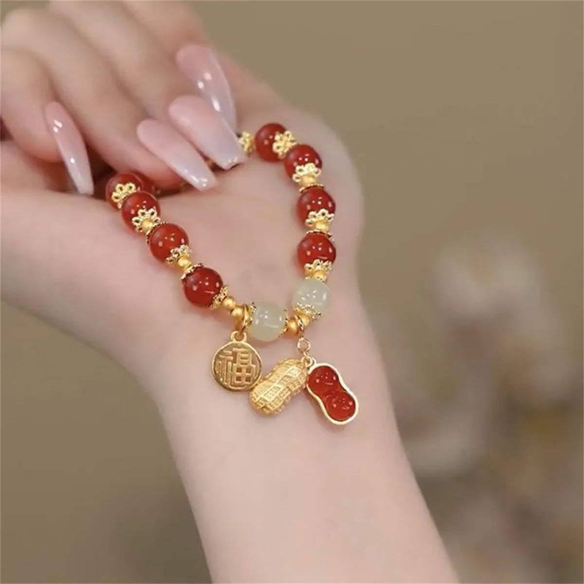 Handcrafted glass and coloured glaze bracelet with rabbit charm in national style design