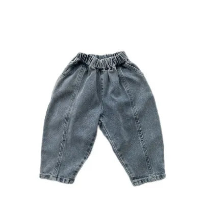 Light blue children's baggy denim jeans with elastic waistband, front view