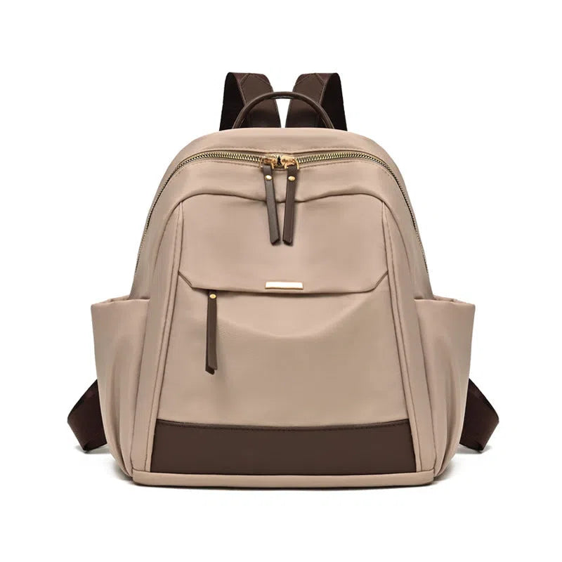 Women's large-capacity nylon travel backpack in black or milk tea colour with polyester lining and internal patch pocket.