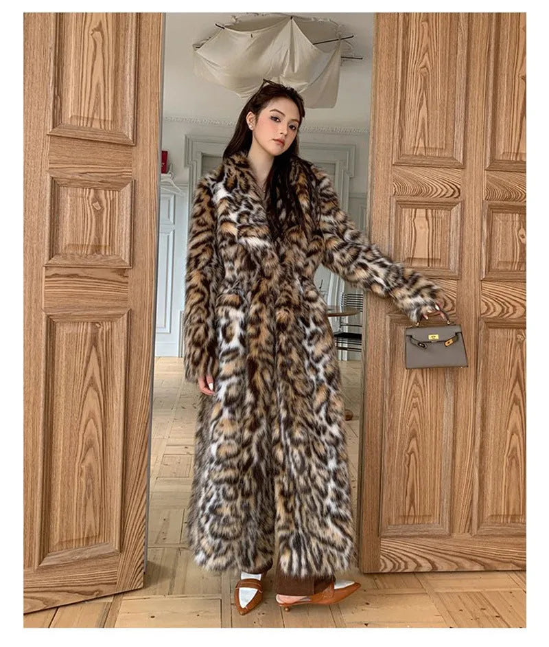 Long faux fur coat with fur collar and pockets in artificial fur fabric