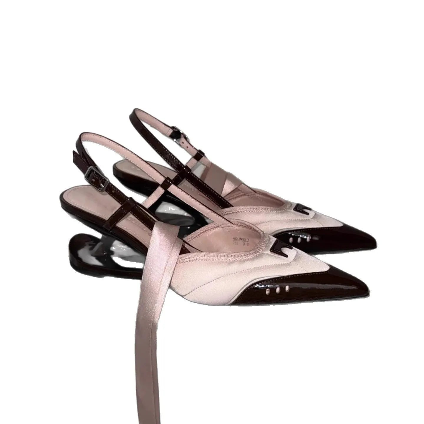 Women's black lace-up high heels with a special-shaped root design on a white background.
