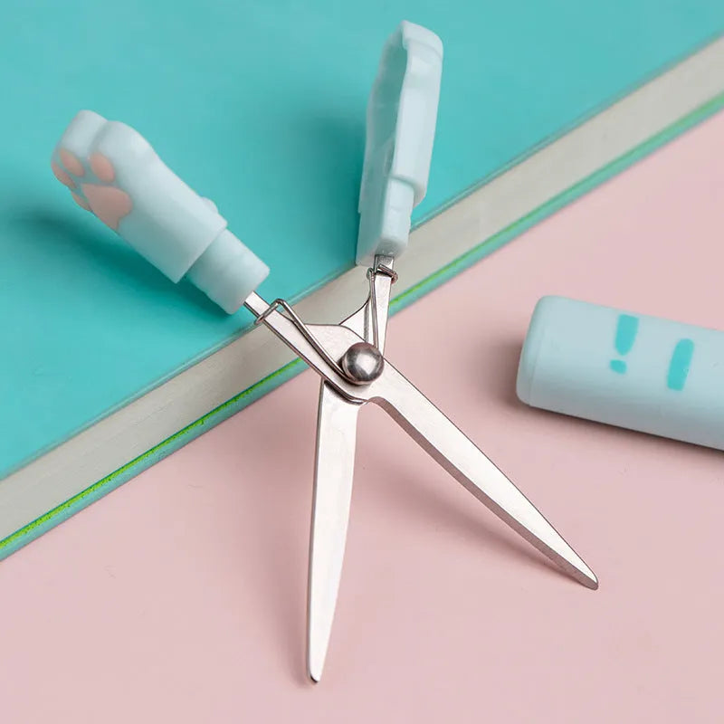 Cat claw folding pen-type scissors, 1.3cm x 8.7cm ABS+ body, shown in Black, Blue, Pink and White