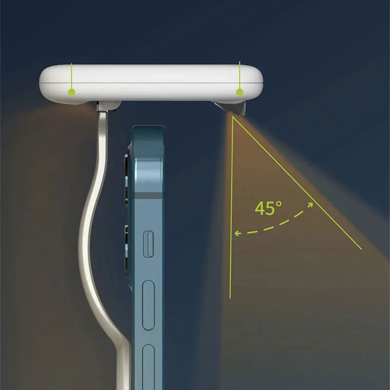 Black MagSafe compatible screen hanging light mounted on tablet showing dimmable reading illumination