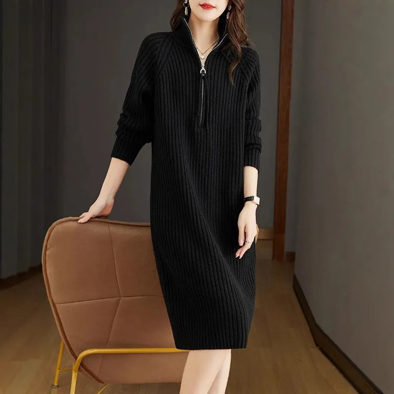 Beige half zip stand collar straight skirt with long sleeves on a mannequin