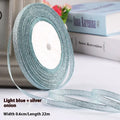 Roll of 0.6cm wide decorative polyester ribbon in a choice of 21 colours including metallic options.