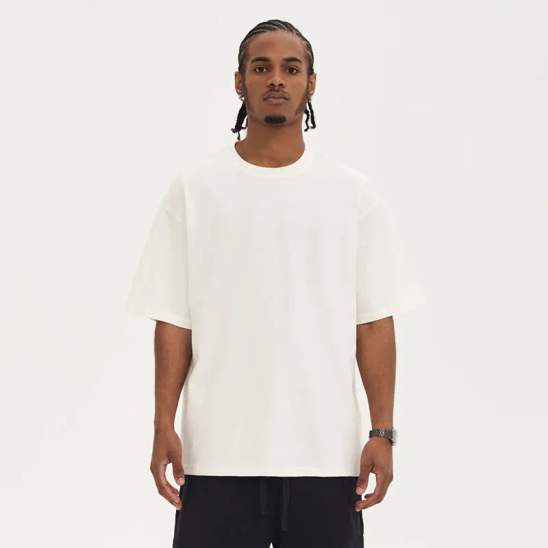 Loose fit combed cotton short sleeve top and pants set in solid colour with drop shoulder design